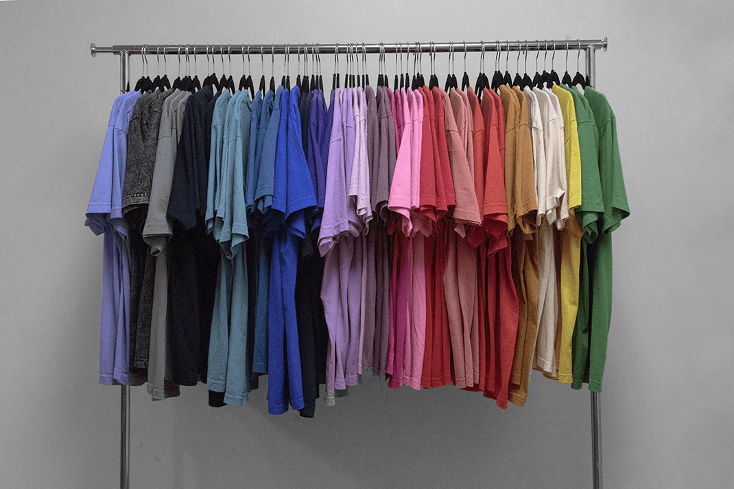 Rack of Los Angeles Apparel T-shirts in multiple colors