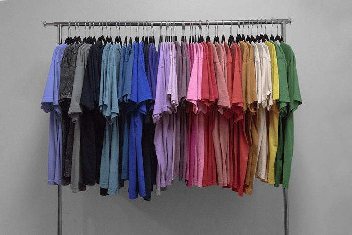 Rack of Los Angeles Apparel T-shirts in multiple colors