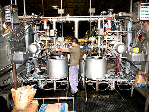 Garments moving through the Los Angeles Apparel dye process