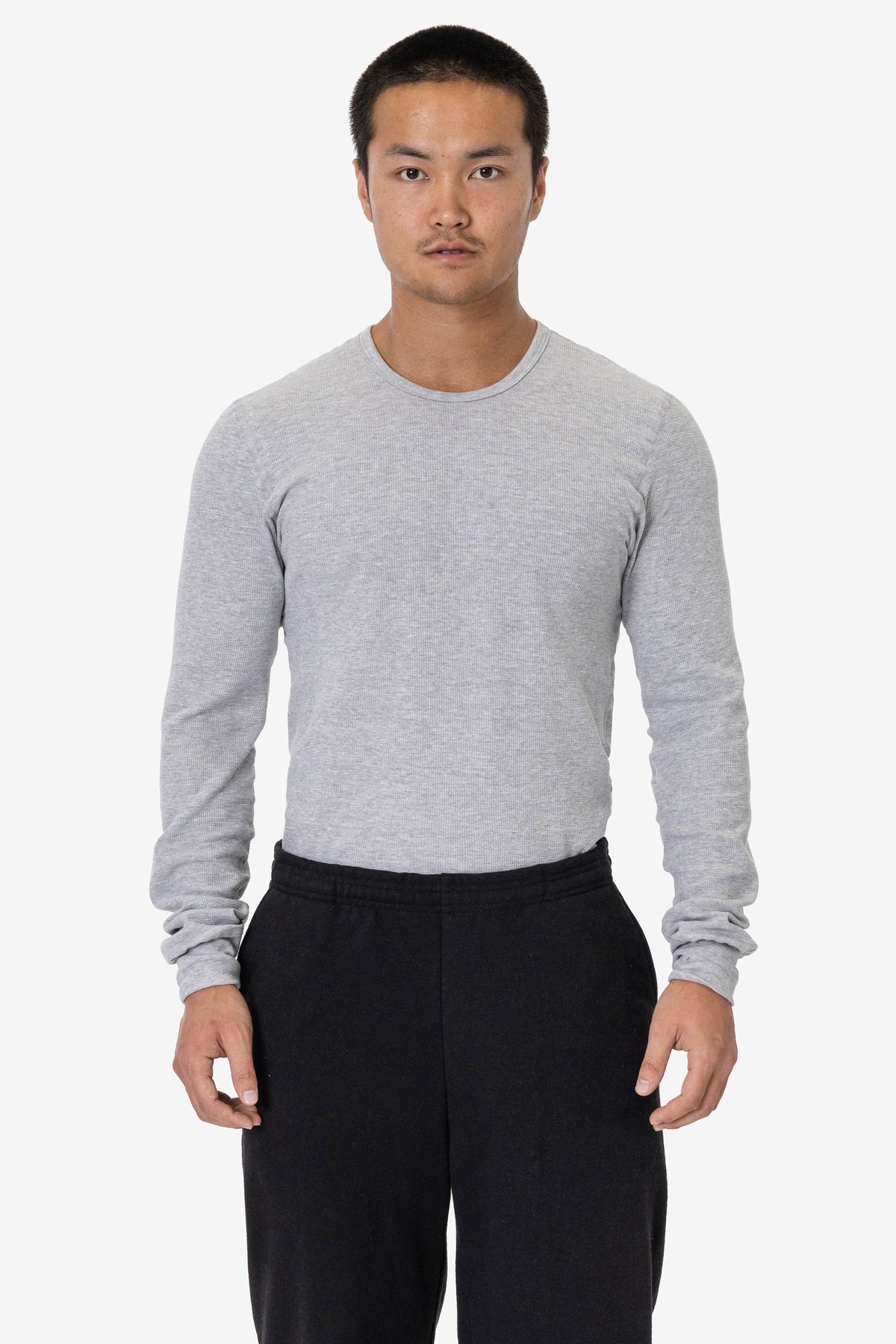Model wearing the Heather Grey Poly-Cotton Thermal Long Sleeve Crewneck