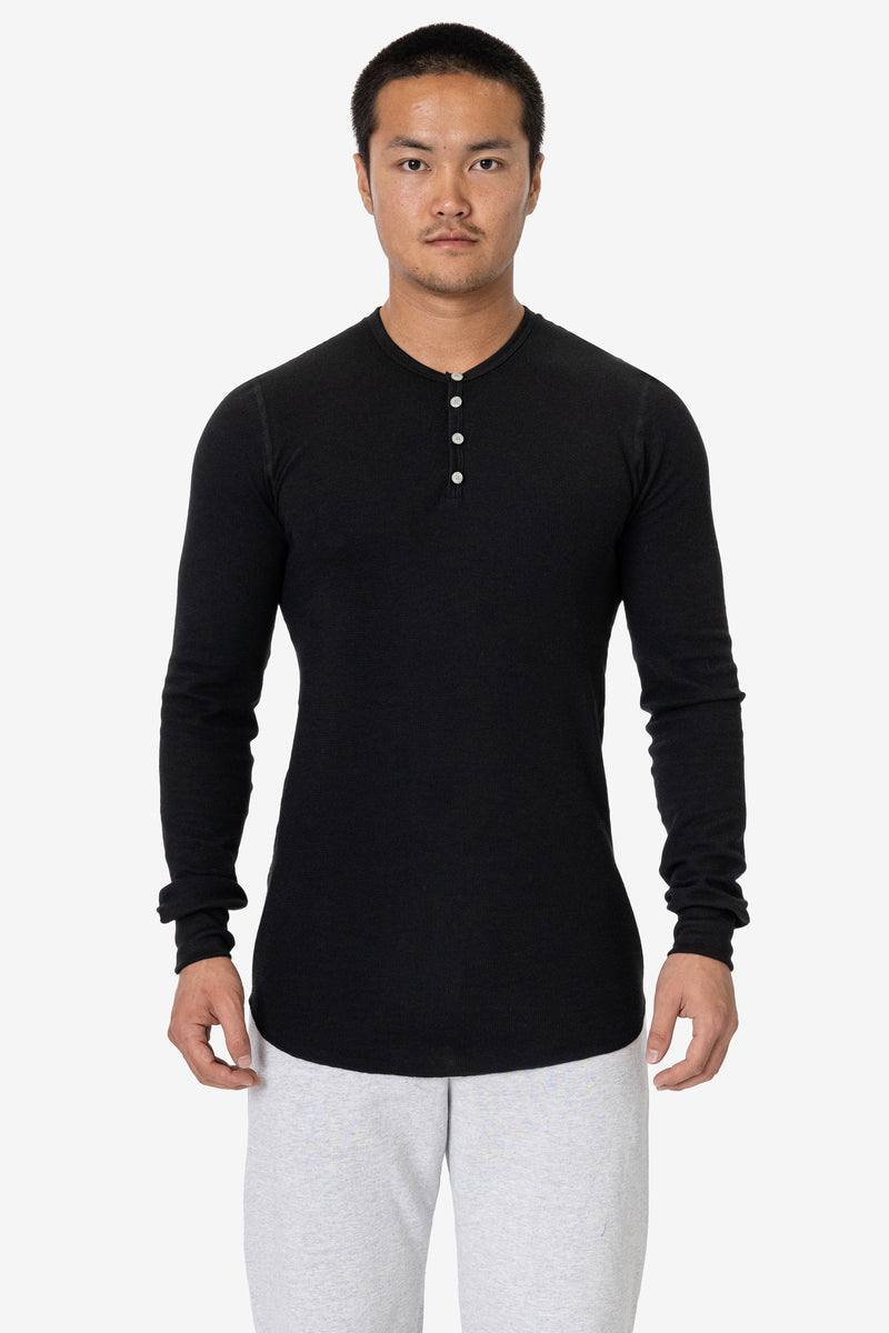 Man wearing the black Los Angeles Apparel Poly-Cotton Thermal Henley