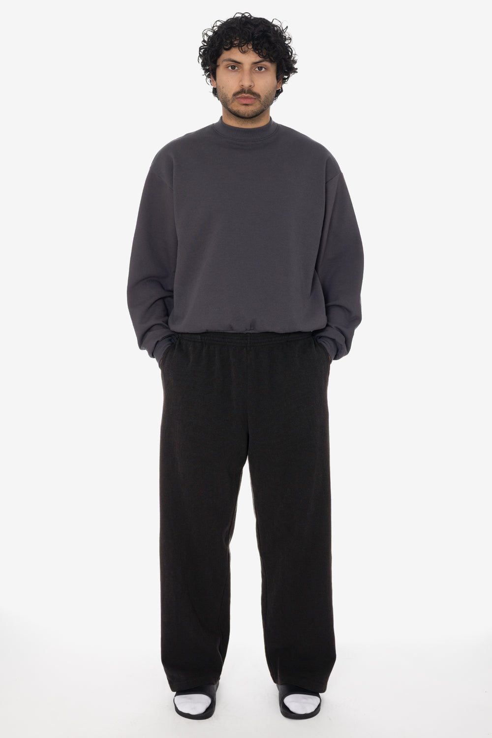 Model wearing black Heavy Thermal Garment Dye Sweatpants