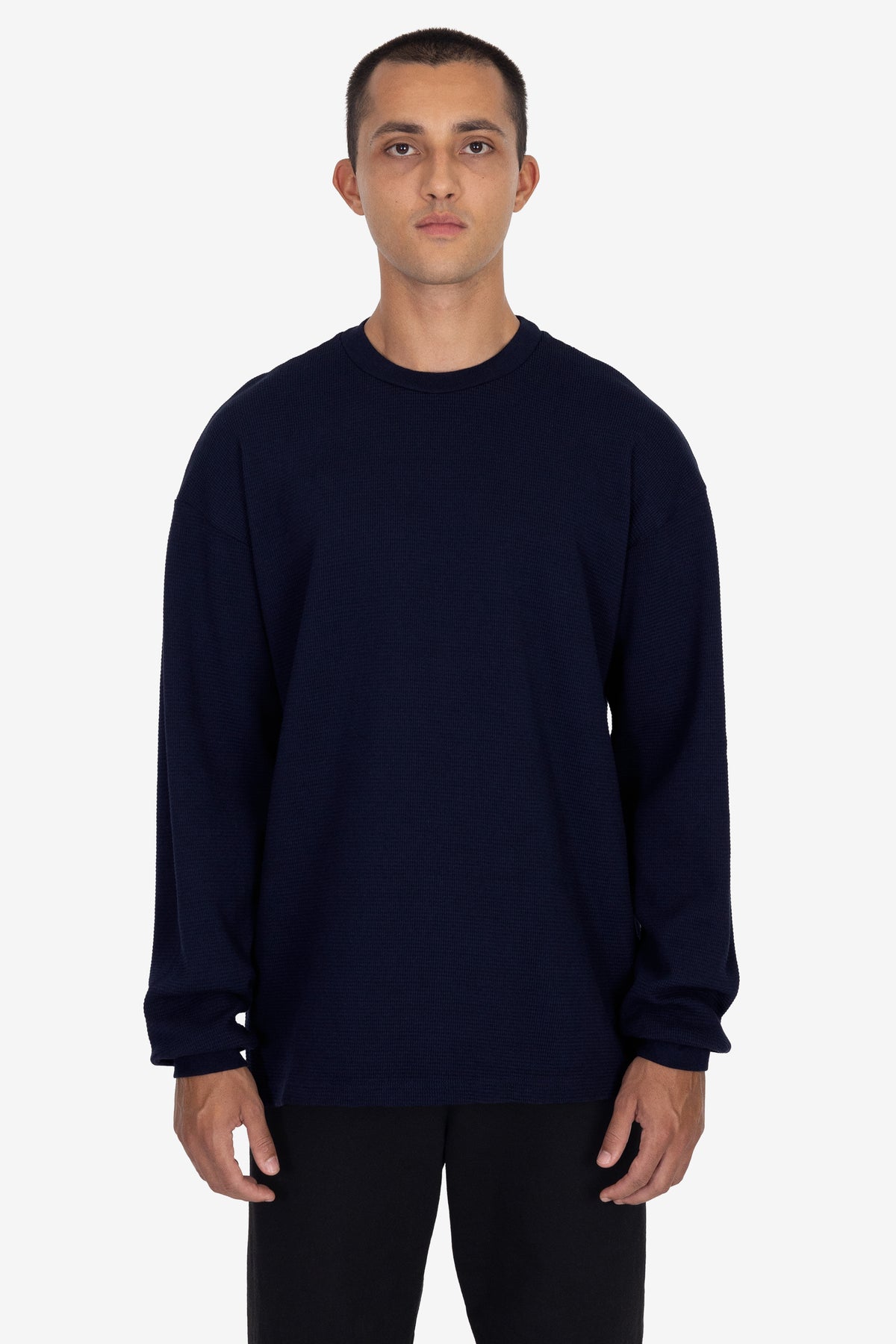Model wearing the Long Sleeve Heavy Thermal Crew Neck for a direct construction comparison