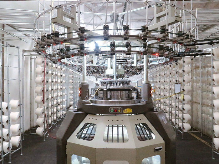 Circular knitting machinery inside Los Angeles Apparel production