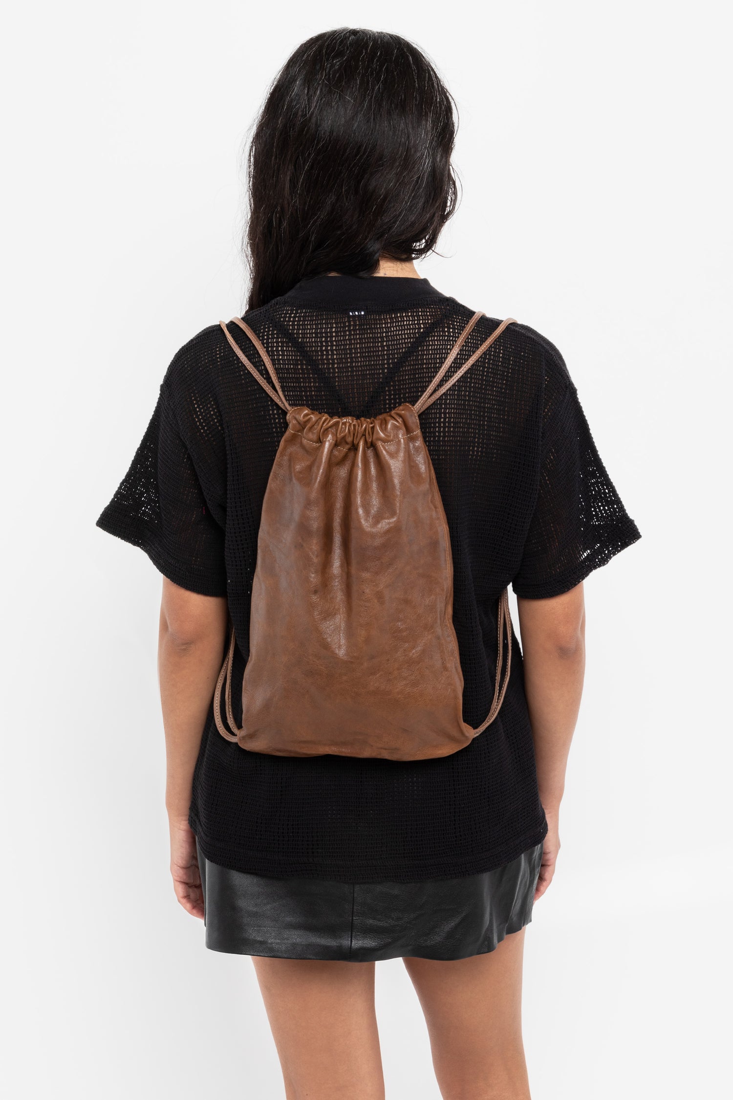 cheap leather drawstring backpack Piel Top Flap The Traveler Drawstring Backpack is your ideal companion for everyday adventures Los Angeles Apparel | Leather