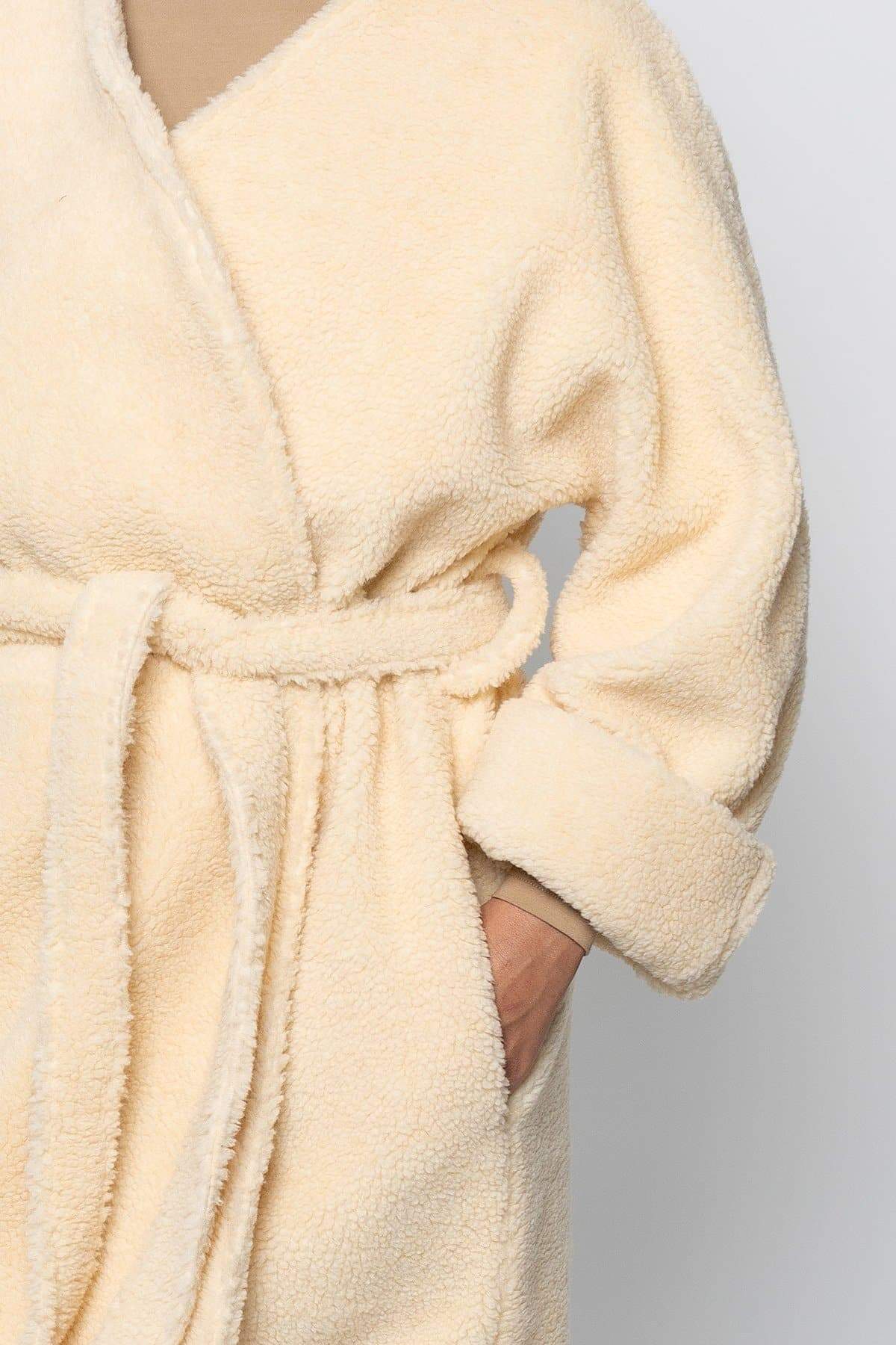 Cream wrap store coat